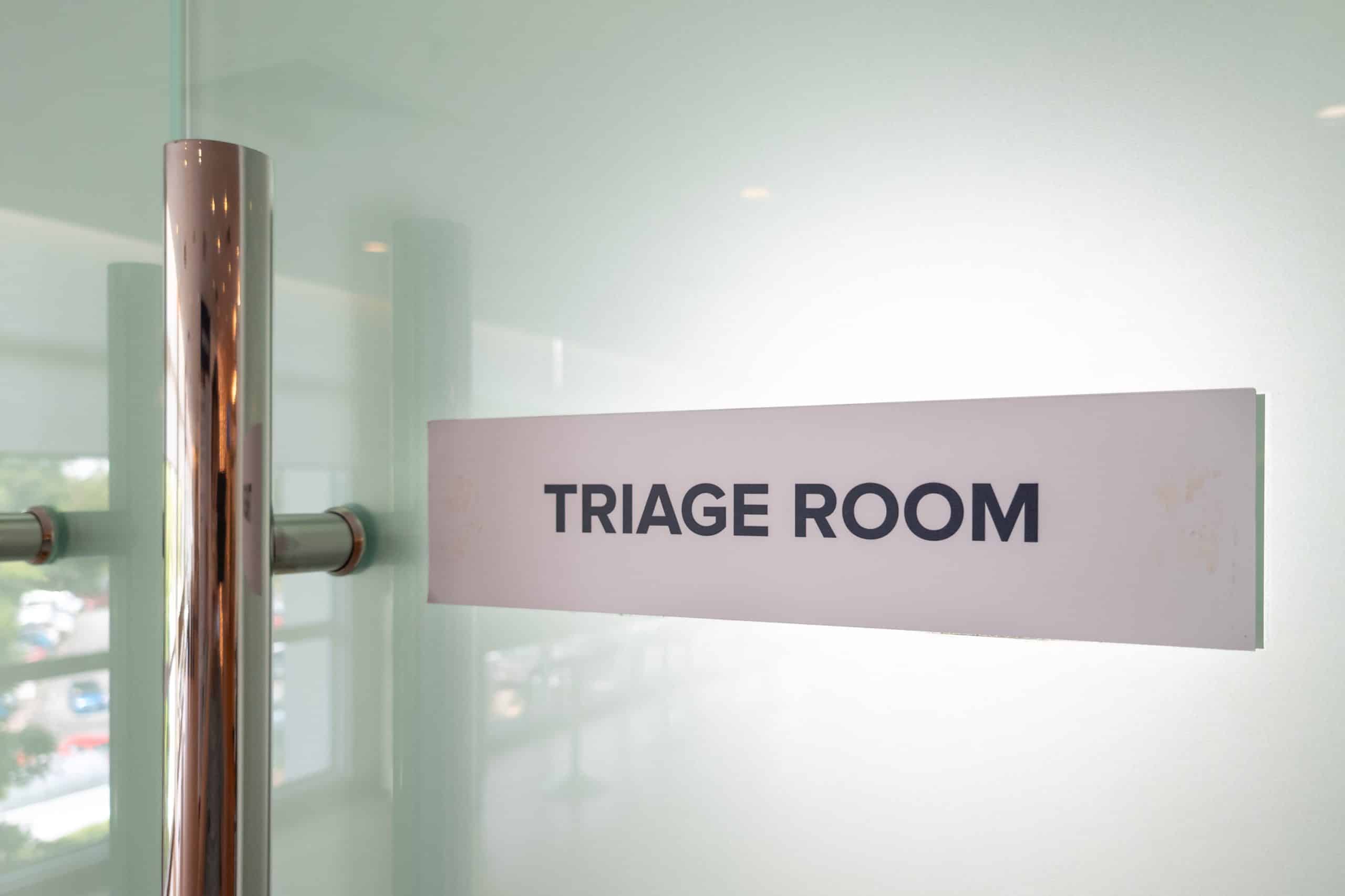 Concept of the word Triage Room at the emergency entrance of hospital or medical clinic