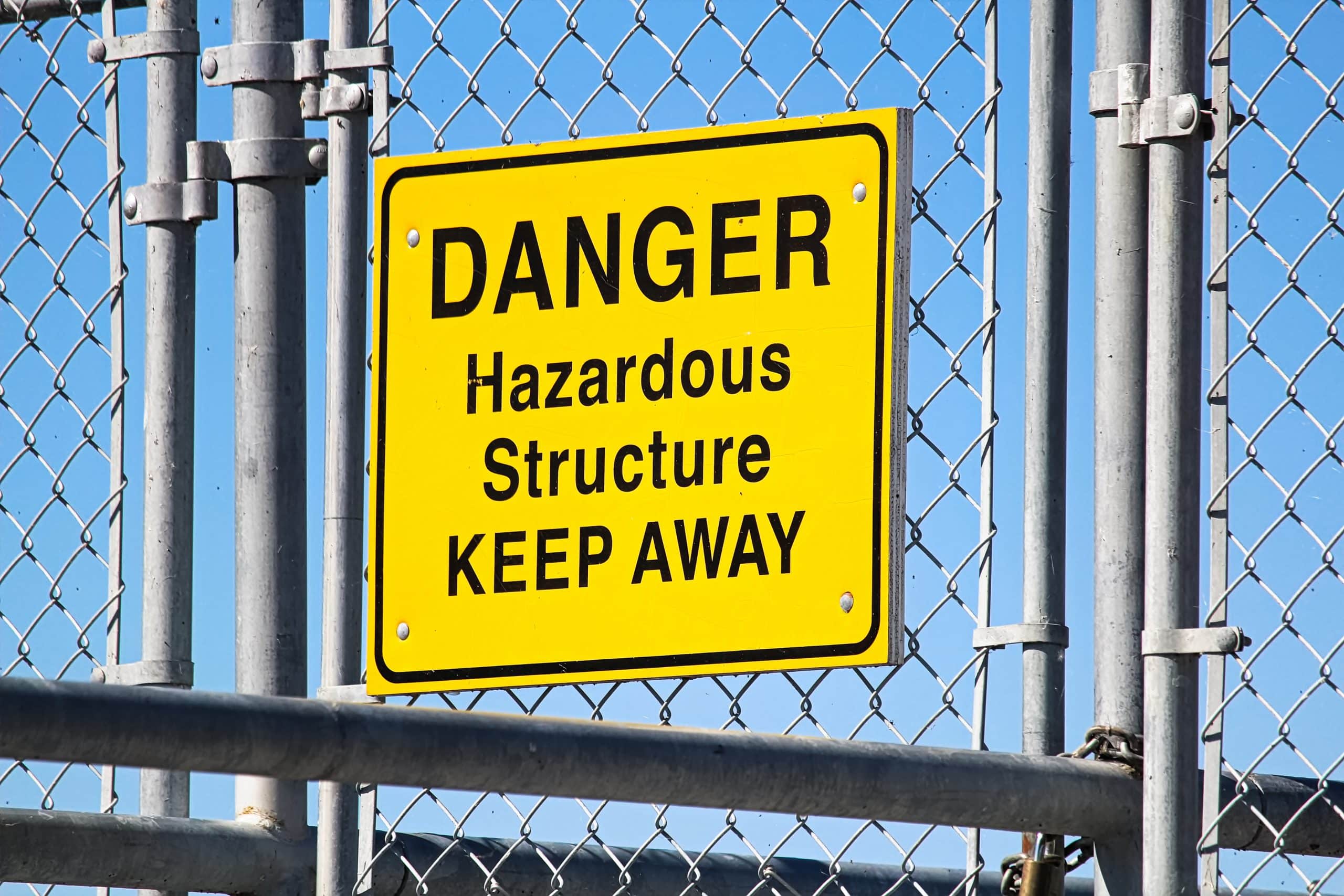 A Danger Hazardous Structure Keep Away sign
